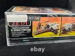 1983 Kenner Star Wars X-Wing Fighter dans son emballage d'origine ROTJ Battle Damaged AFA 75 SPM