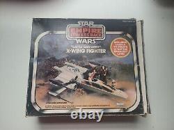 Chasseur X-Wing Star Wars vintage endommagé au combat de 1978 de Kenner avec boîte