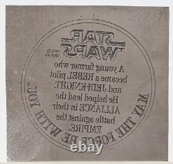 Traduisez ce titre en français : Star Wars 1984 Vintage Kenner Luke X-Wing POTF Coin Etching Plate (Dos de la pièce)